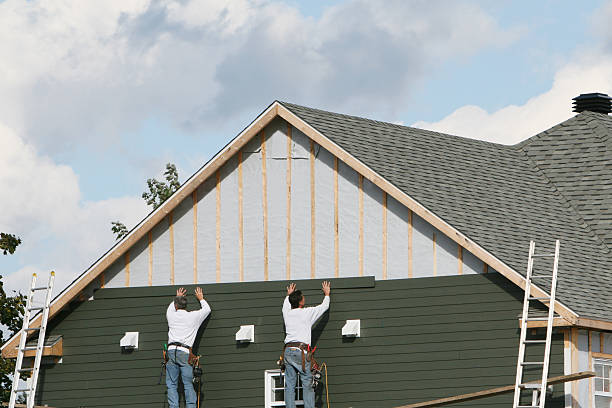 Professional Storm Damage Siding Repair technician working in Yorkville, IL